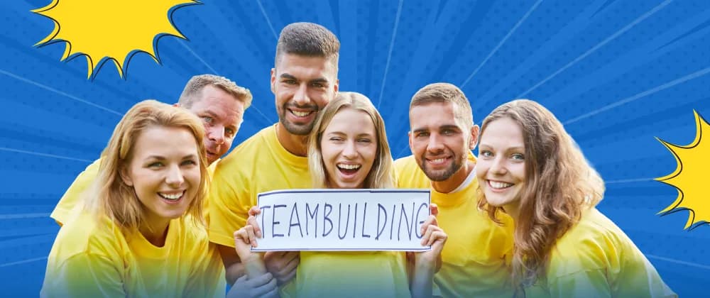 Six smiling coworkers in yellow T-shirts holding a hand-lettered "Teambuilding" sign